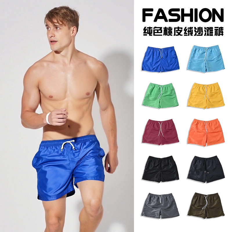 Pantalones de playa de vacaciones junto al mar para hombres transfronterizos de piel de melocotón de cuatro puntos de tamaño europeo suelto con forro de natación y surf para hombres