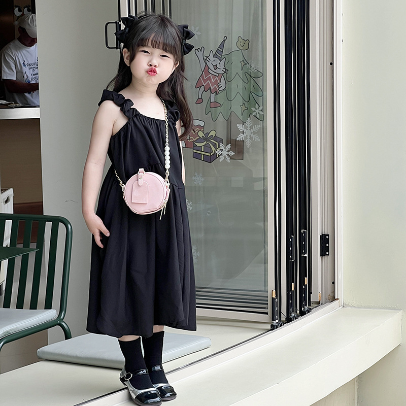 Bolsa de hombro coreana para niños y niñas de color sólido de perlas extranjeras mini bolso para bebés 2025 nueva cadena bolso para niños