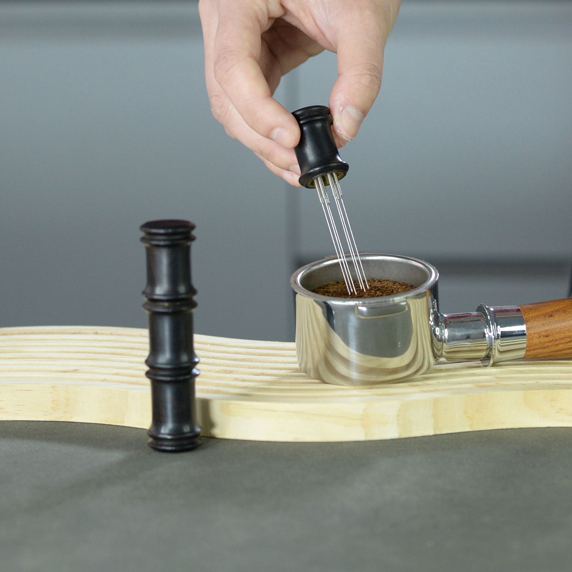 Polvo de tela café aguja polvo suelto aguja paño de madera dispositivo polvo sólido polvo suelto aguja base Acero inoxidable separador