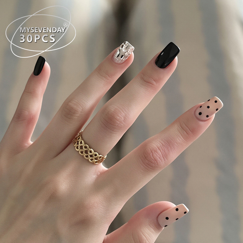 TikTok's popular wearable nail tips with rhinestones, black polka dots, and pink accents, short style, luxurious pre-made nails
