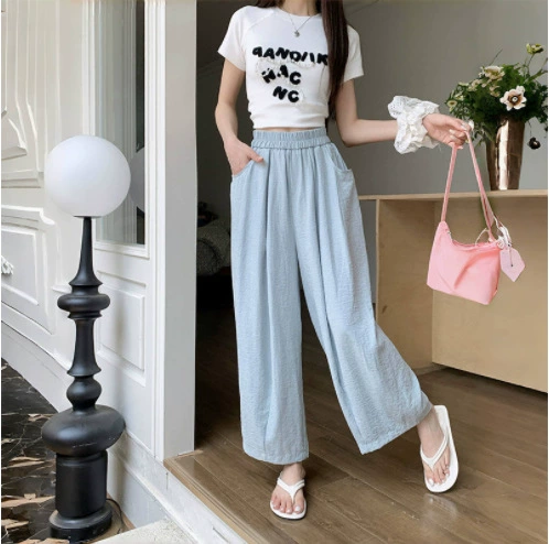 Синие брюки бабушки в корейском стиле для женщин, лето 2025, новые укороченные брюки-морковки из ледяного шелка с высокой талией для похудения.