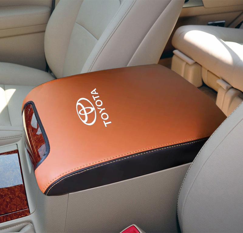 Armrest Box Cover: Toyota Armrest box pad - 2008-2020-cayenne-color-mixed-black-with-logo