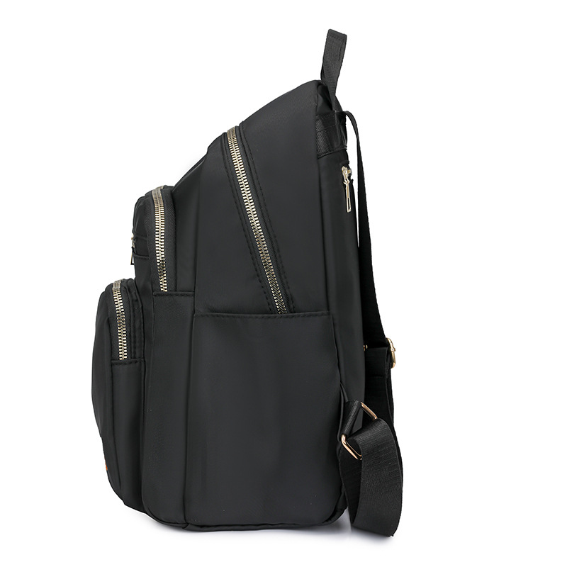 Mochila de tela Oxford para mujer 2024 nueva moda mochila de todo fósforo diseño de nicho mochila de viaje de viaje