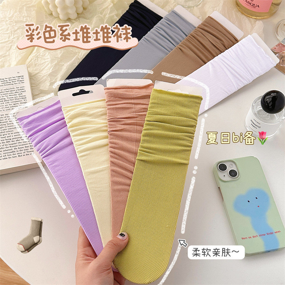 Calcetines de hielo calcetines de terciopelo de primavera y verano para mujer medias de media pantorrilla calcetines de JK largos blancos puros calcetines de moda al por mayor