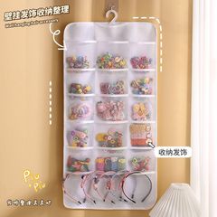爆発的な卸売りの子供の髪飾り収納袋のカチューシャの髪飾りクリップの壁掛け分格整理布芸収納袋があります。