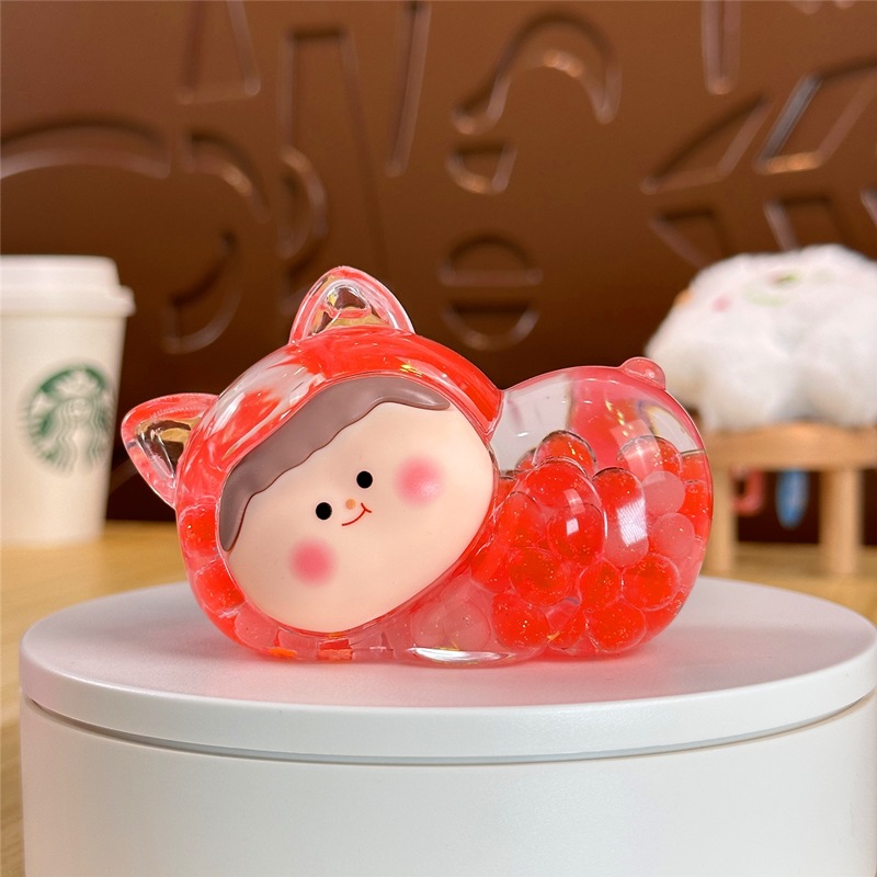Nocturno explosivo gato macarón super lindo dibujos animados arena flotante en aceite caja ciega pequeña bolsa ciega adornos al por mayor