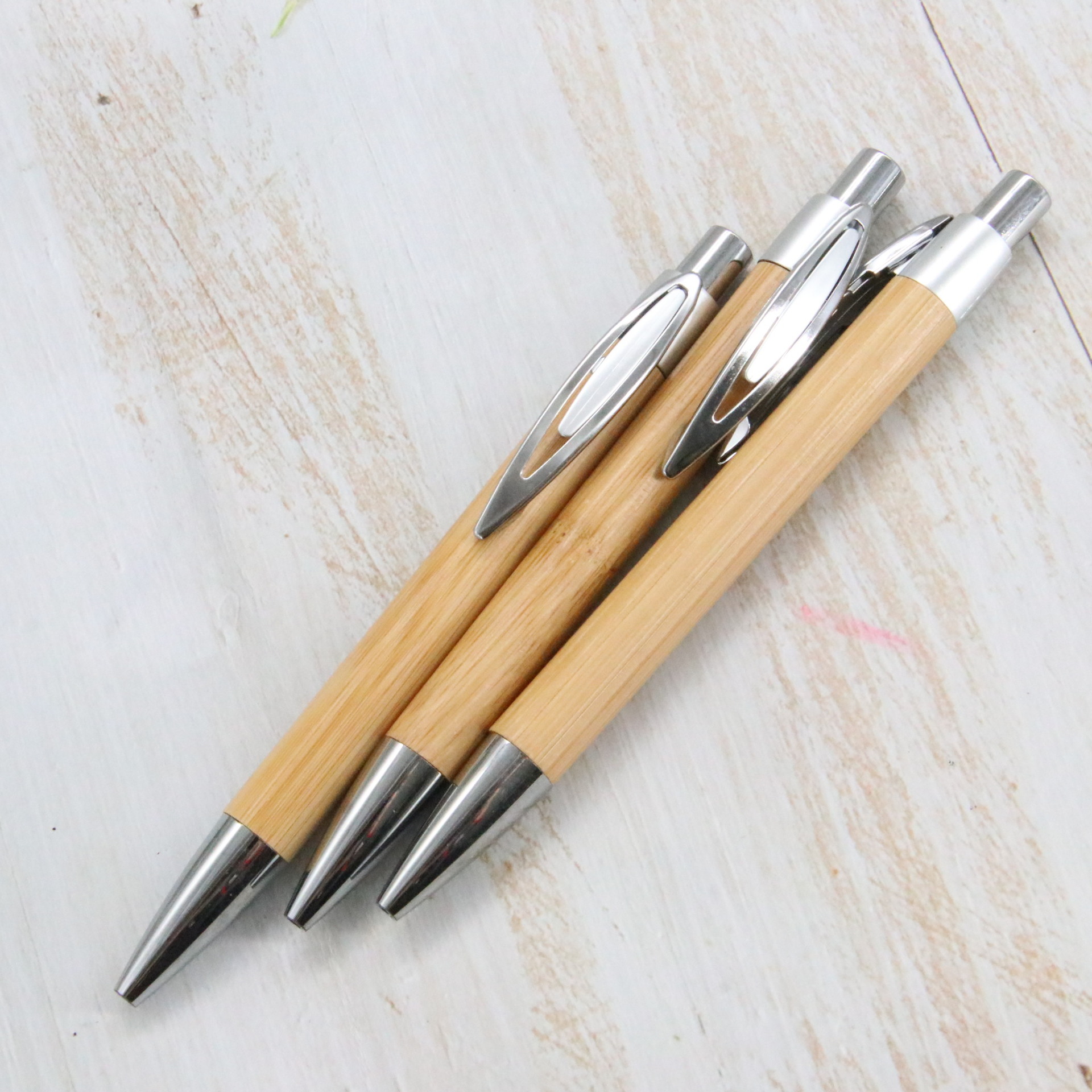 Lápiz de bola de bambú y madera prensa lápiz de movimiento accesorios metálicos logotipo láser