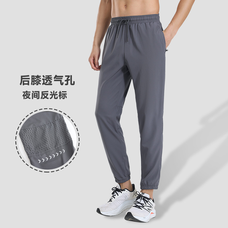 Pantalones deportivos de secado rápido para hombres pantalones casuales de primavera y otoño fitness deportes pista y campo de entrenamiento elástico alto pantalones atados al tobillo