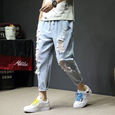 spring and autumn hole Jeans man Large leisure time Ninth pants The fat Easy Haren pants Korean Edition Beggar pants