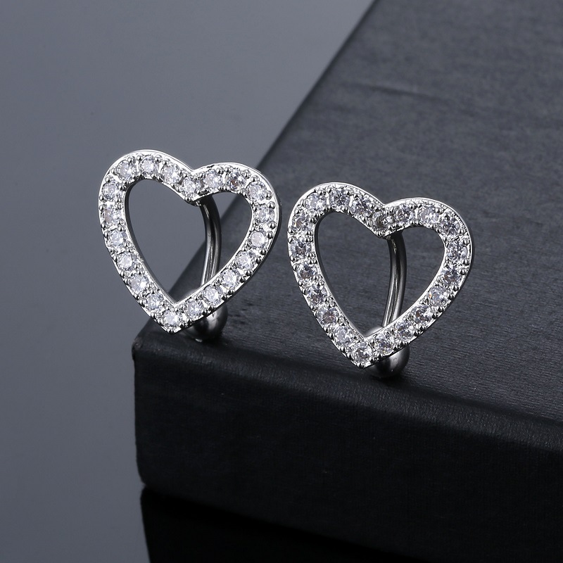 Factory direct supply puncture jewelry European and American fashion new belly button ring belly button nail heart-shaped full inlaid stone