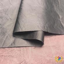 190g压皱仿皮锻面布 梭织全涤肌理感锻布料 时装汉服礼服旗袍面料