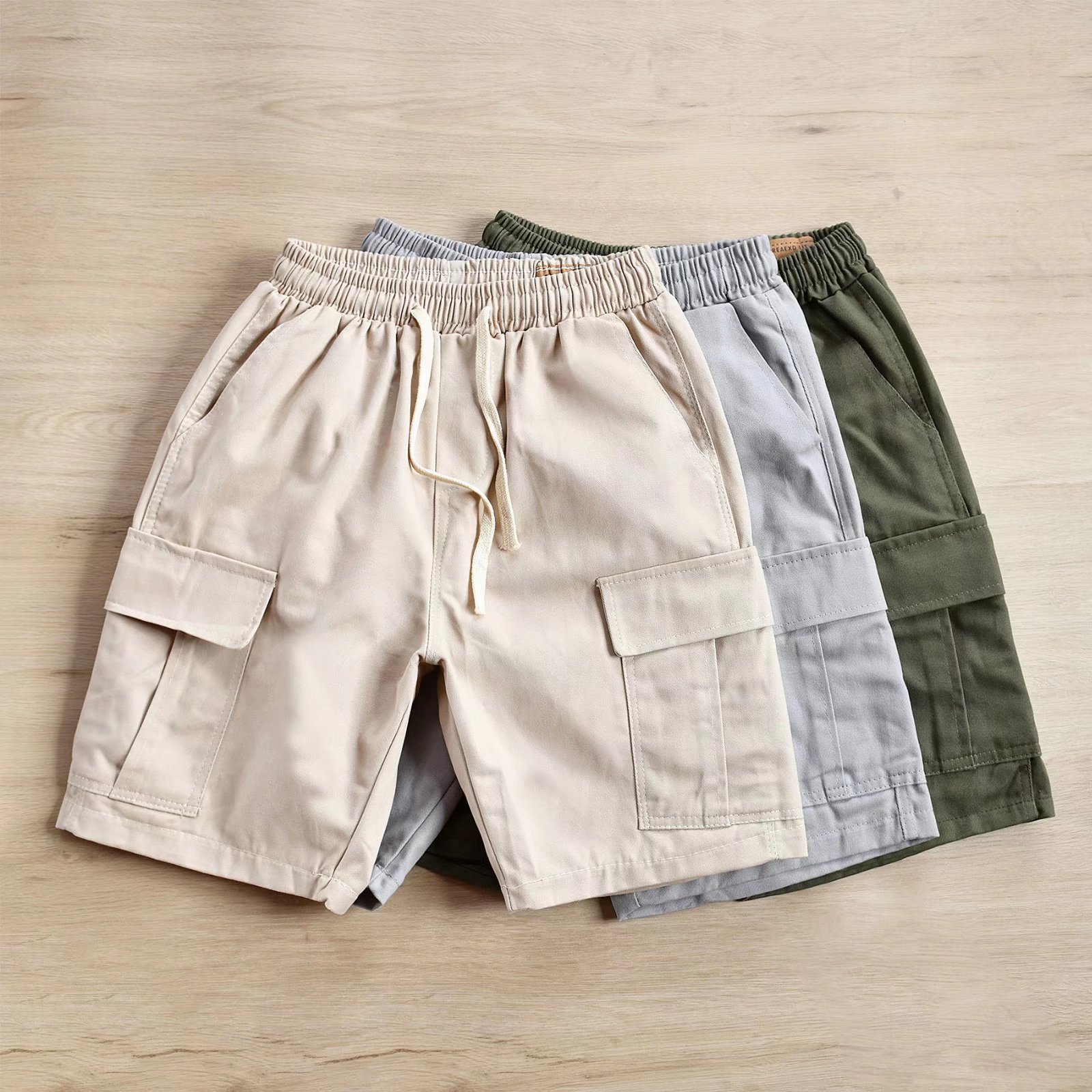 Summer new men's shorts Korean fashion brand multi-pocket overalls youth loose casual pants a generation of hair