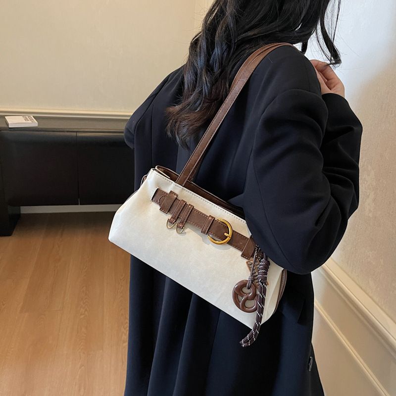 Bolsas de brazo de moda retro transfronterizas para mujeres 2025, otoño y invierno, bolsas de nicho para mujeres, bolsas de hombro simples, bolsas de mano para viajar