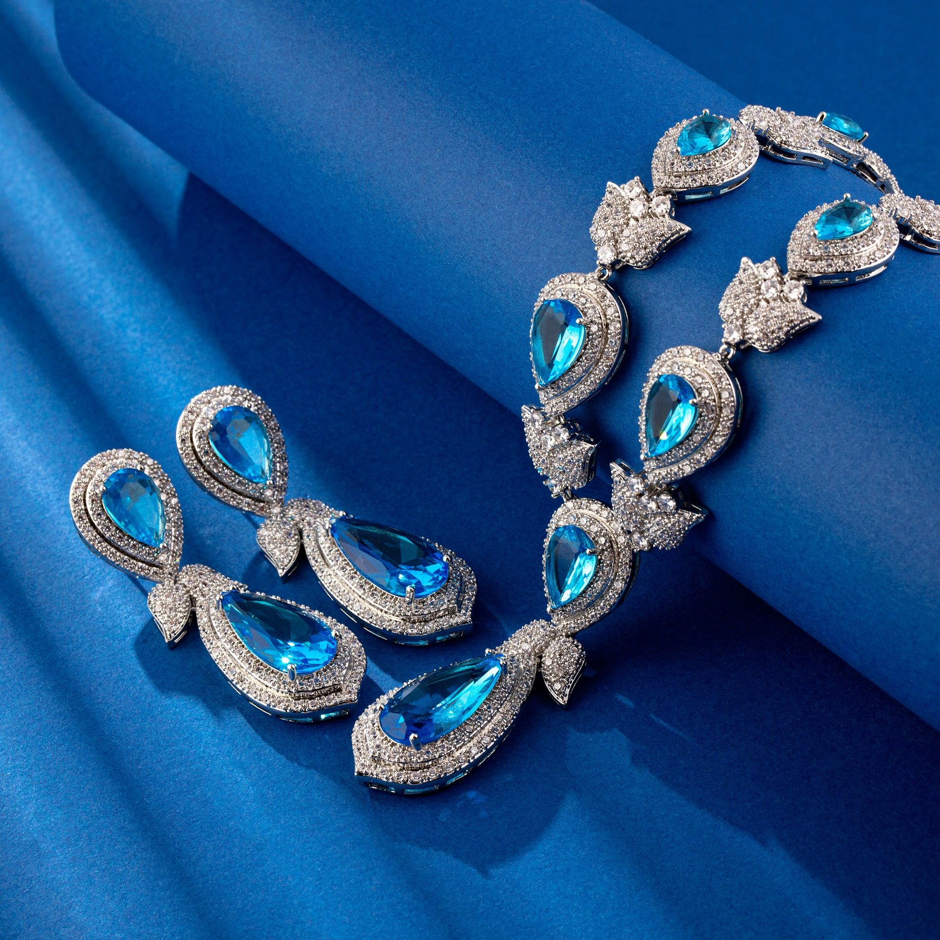Elegant teardrop crystal necklace set available in five colors