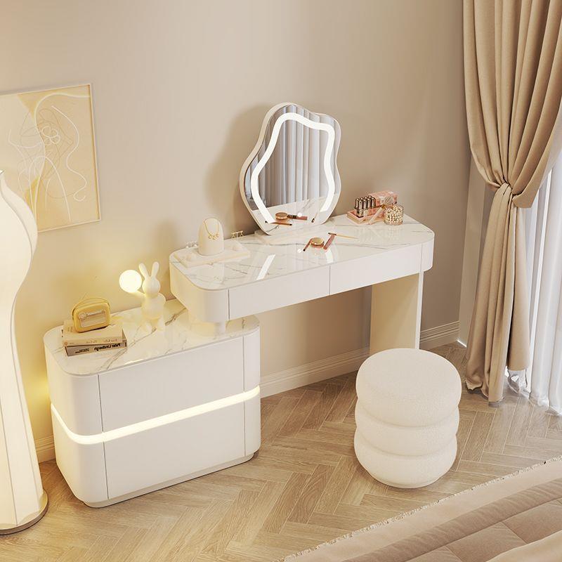 Cajones de aire de crema de atmósfera de lámpara de vestuario de almacenamiento en un armario de lujo moderno y simple mesa de maquillaje retráctil mesa transparente