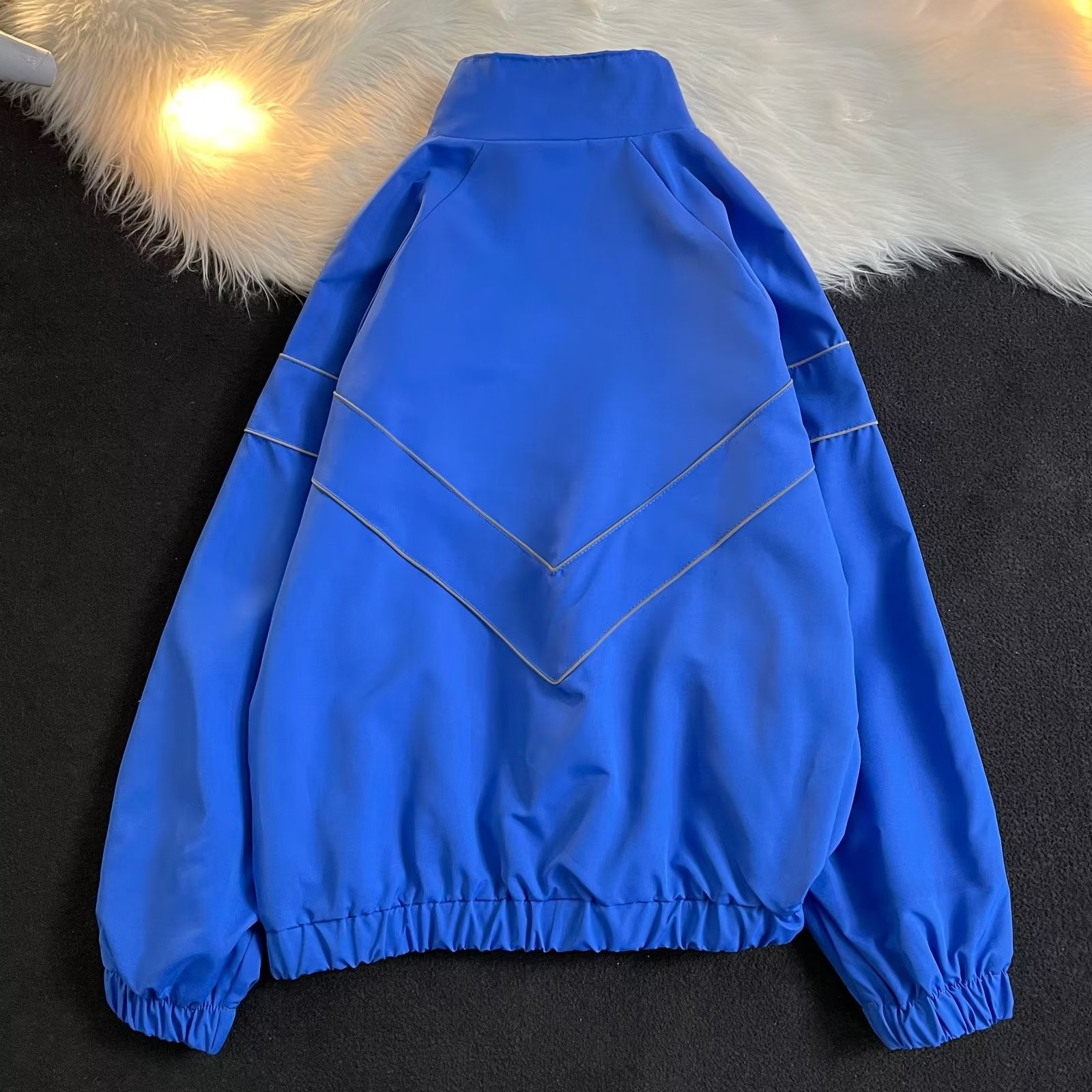 2024 Neue trendige einfarbige reflektierende Sportfunktionswindjacke für Männer und Frauen mit lockerer Stormtrooper-Jacke_voghion.com