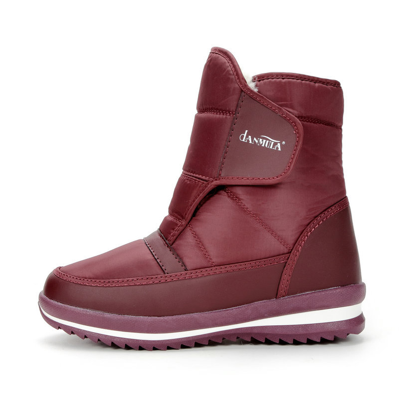 Botas de nieve para hombre y mujer, forradas de lana y engrosadas para invierno, de suela plana, talla un número más pequeña, venta al por mayor y al por menor de grandes fábricas, forradas de lana para mayor calidez.