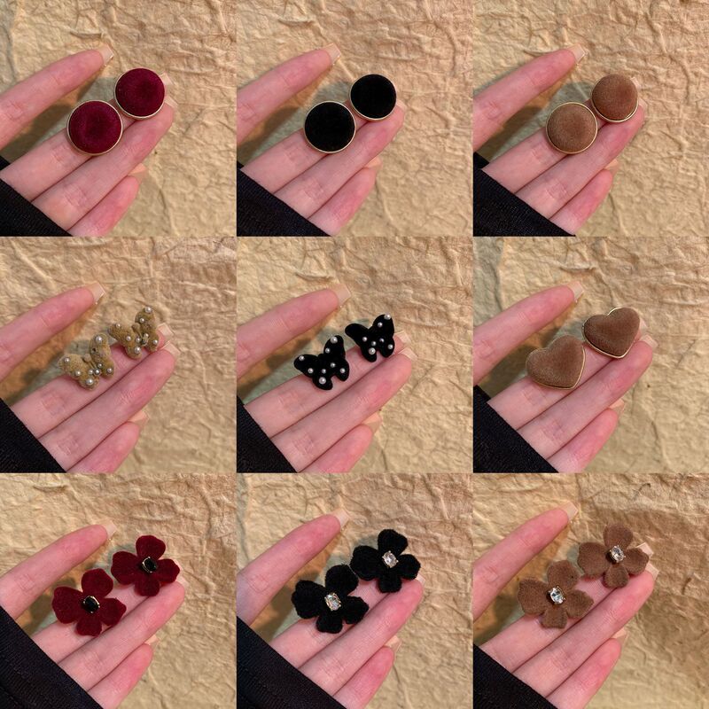 Autumn and winter flocking flower earrings women 2025 new vintage Hong Kong wind plush earrings fashion Joker earrings wholesale