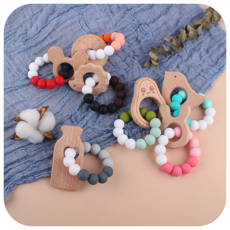 Nueva DIY creativo de dibujos animados juguete de haya mordedor bebé Beech biberón cuentas de silicona pulsera teether stick