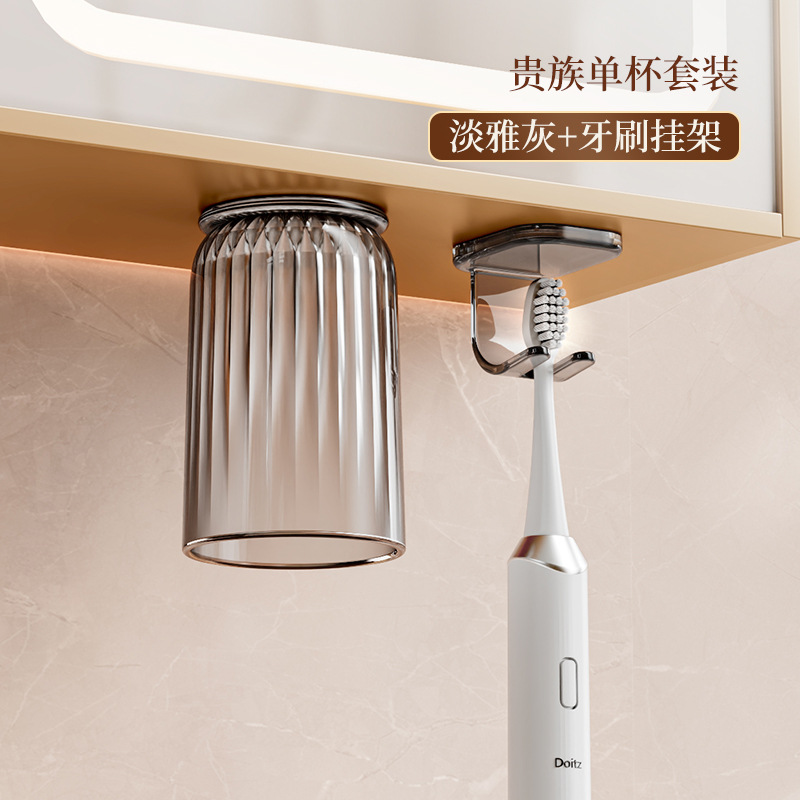 Gabinete de espejos Soporte para cepillos de dientes de succión magnética Taza de enjuague bucal con hebilla invertida Una familia de cuatro montones en la pared Cepillo de dientes de drenaje sin perforación Estante de almacenamiento de tazas