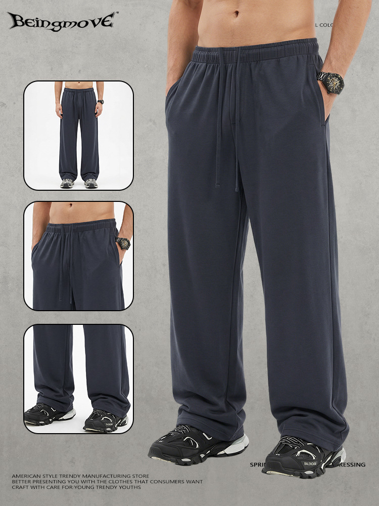 Calle seca nueva tela de capa de aire transpirable color sólido pantalones rectos cuerdas sueltos pantalones deportivos casuales para hombres