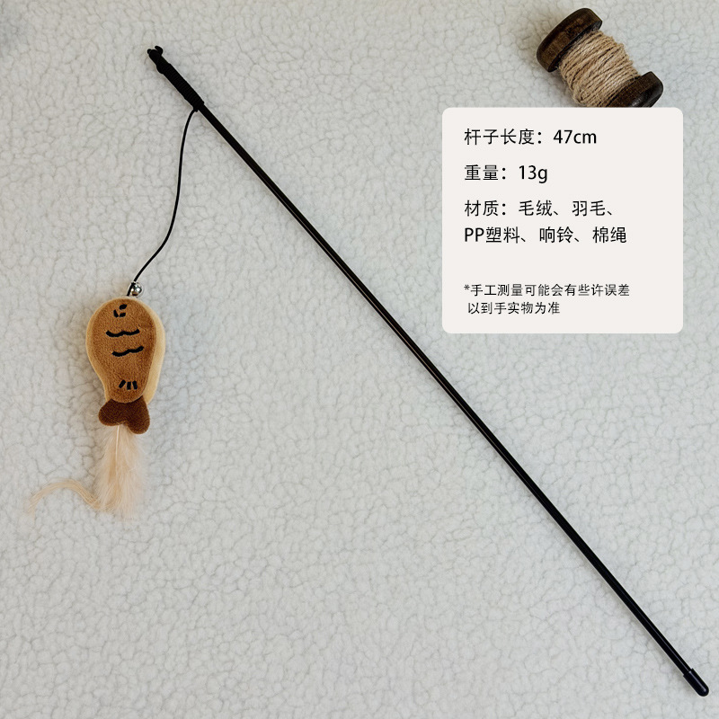 일본 고양이 재미있는 스틱 갈색 물고기