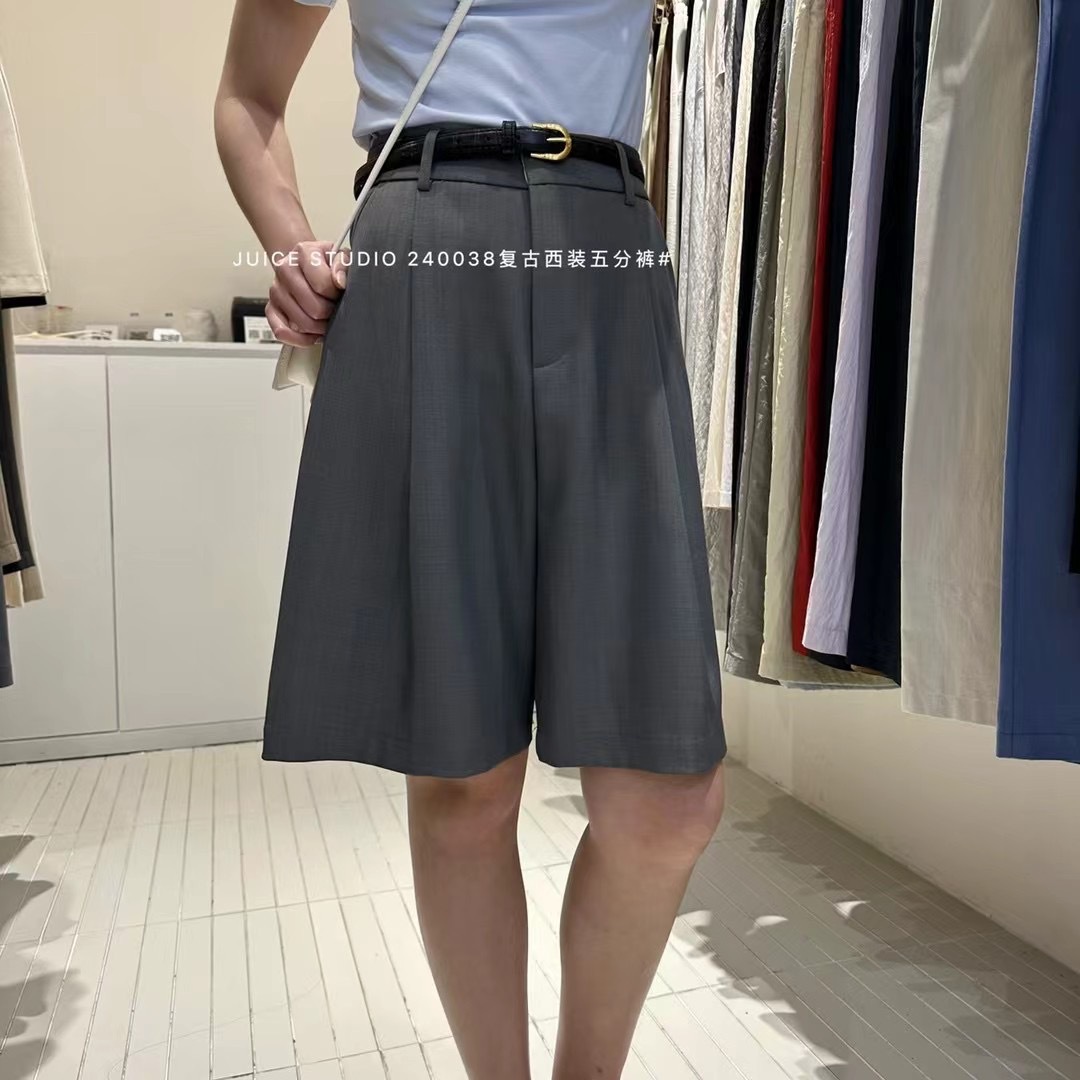 Liquidación sin devolución 240038 verano pantalones cortos casuales sueltos simples pantalones anchos delgados de cintura alta para mujer pantalones de cinco puntos