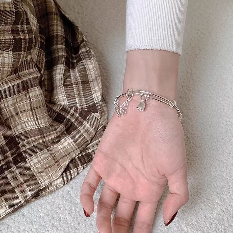 Flores florecientes brocadas pulsera push-pull sólida estambre femenino estilo mariposa temperamento de nicho sentido avanzado pulsera ajustable todo fósforo