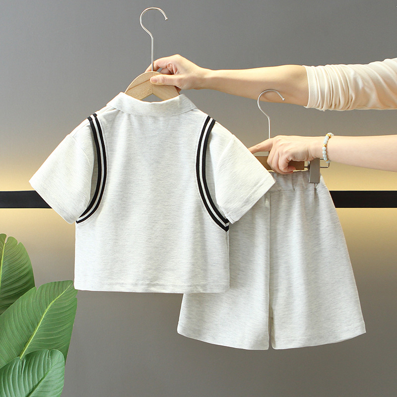 7880 traje de verano para niños 2025 nueva camisa POLO de manga corta para niños de dos piezas ropa de moda de verano para bebés