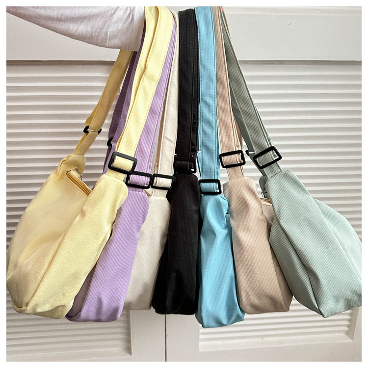 Large capacity canvas shoulder for women in spring summer 2023, new solid color, simple and fashionable casual bag,_voghion.com