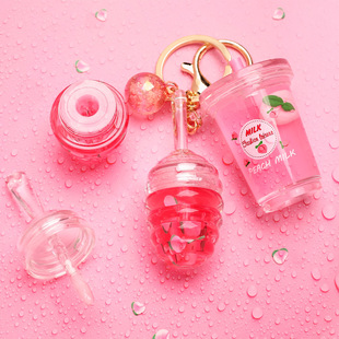 Cross-Border small batch of lip gloss peach floating milk tea cup lip gloss pendant keychain Honey Lip gloss lip gloss order
