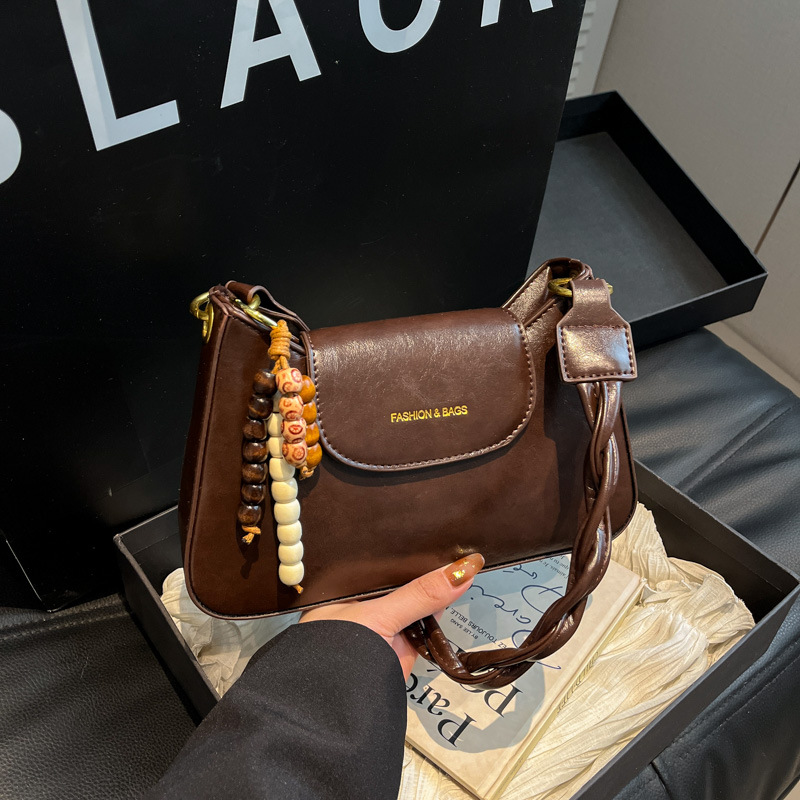 Bolsas de mujer transfronterizas retro de cuero suave de hombro brazo bolsas de invierno 2025 nuevo estilo de alta calidad de la mochila de viaje al trabajo