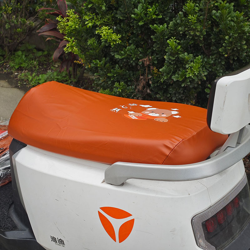 Electric Motorcycle Brown Elastic Leather Cartoon Seat Cushion Sunscreen and Rainproof Yadi Emma Table Bell Thickened Leather Seat Cover