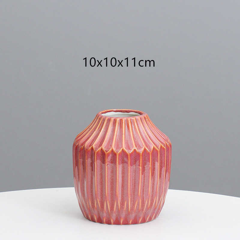 Florero de cerámica al por mayor creativo ins hogar estilo europeo del Norte simple rayado creativo Luz de lujo decoración de arte al por mayor