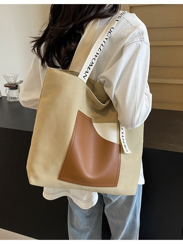 Fábrica directa tote bolsas de lona de niñas bolsas de hombro resistentes al desgaste simple letras impresión bolsas de comercio exterior transfronterizas
