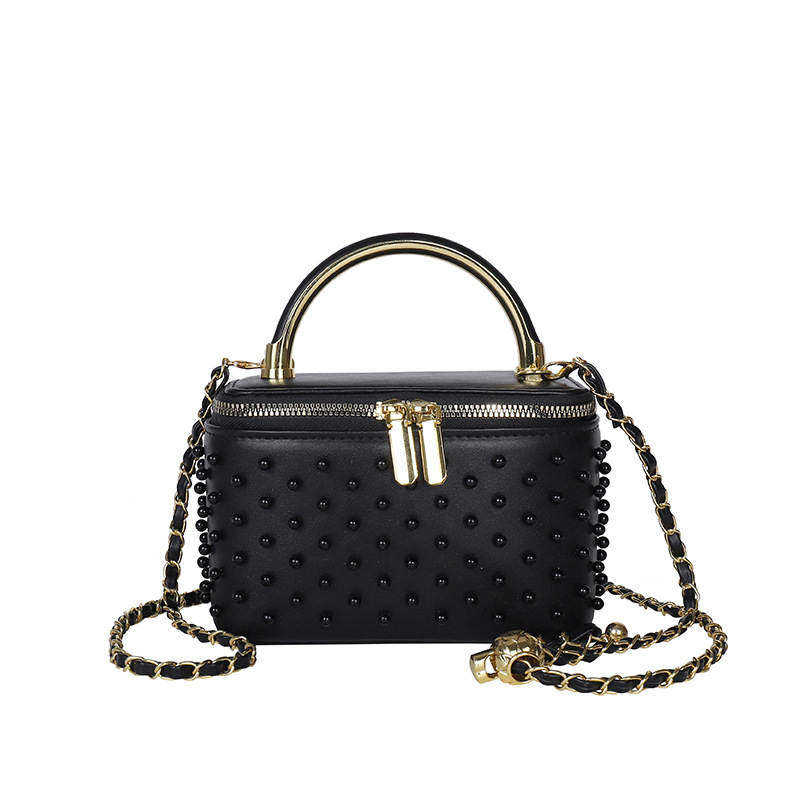 Caja de mano de alta sensación, bolso cuadrado pequeño para mujeres 2026 nueva moda transfronteriza nicho de moda ligero de lujo cadena mochila