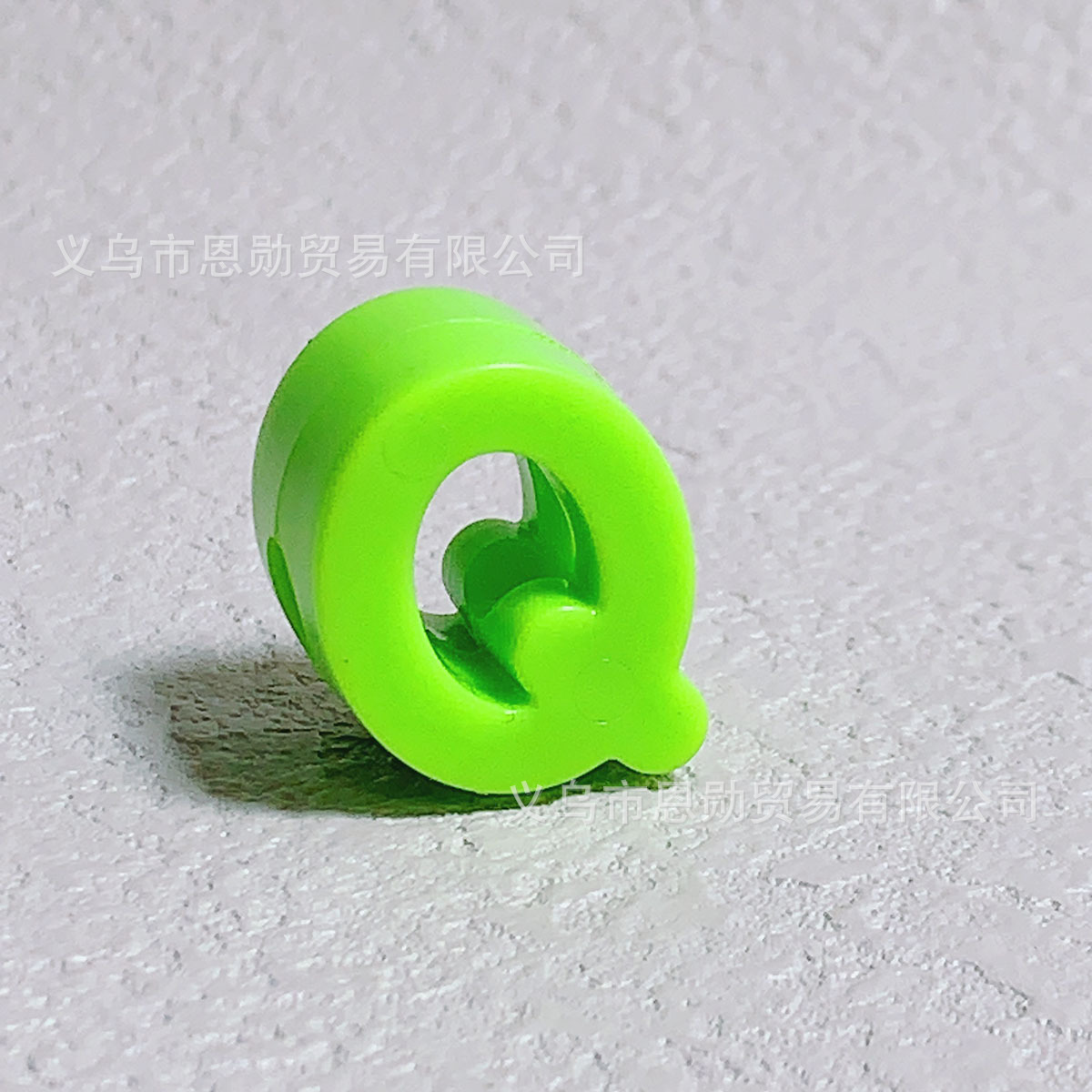 Q (Green)