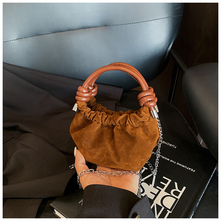 2025 nuevo bolso infantil coreano, mini bolso de ropa de bebé, bolso de hombro para hombres y mujeres, cadena de moda