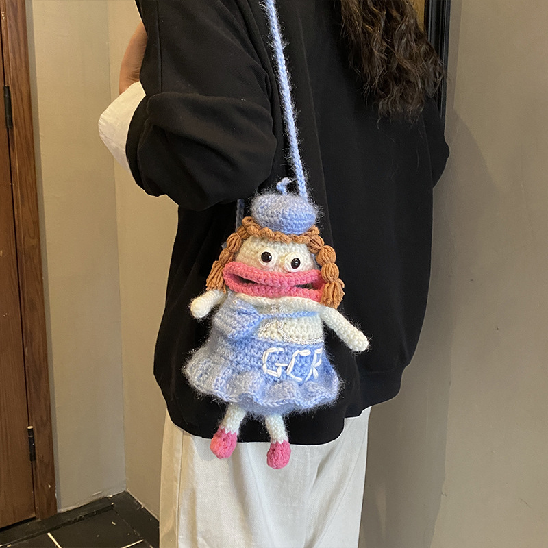 Otoño y invierno nuevo gancho de lana bolsas de niños divertidas extrañas bolsas de accesorios para bebés caricaturas bolsas de cambio para niños y niñas