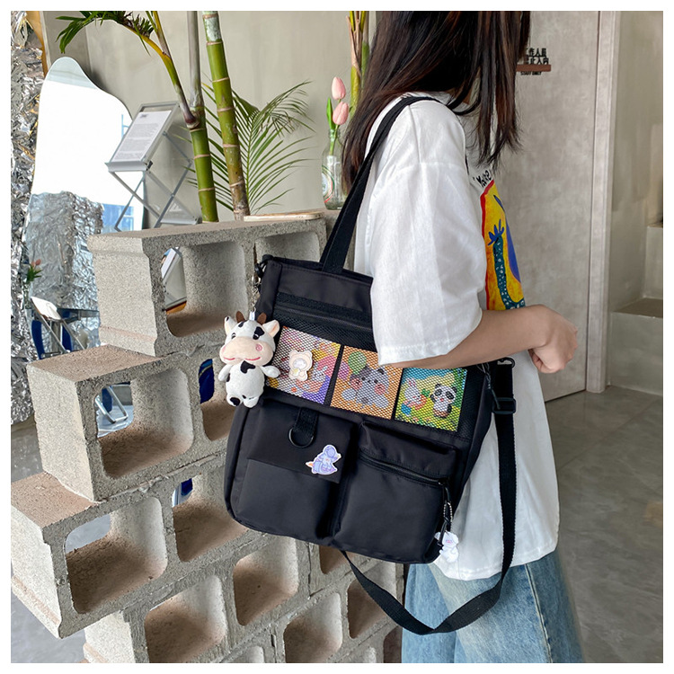 Large-capacity Japanese-style single-shoulder canvas bag for girls, versatile crossbody, ins, a tote bag for junior high school students' classes, and a schoolbag for after-school tutoring undefined