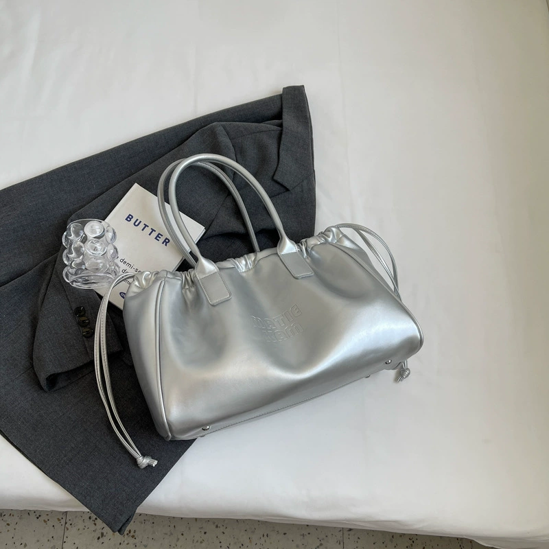 Universal small design shoulder bag, capacious one-shoulder bag, 2023 collection, genuine leather, drawstring