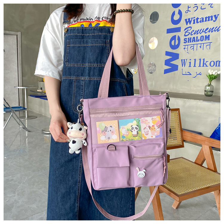 Large-capacity Japanese-style single-shoulder canvas bag for girls, versatile crossbody, ins, a tote bag for junior high school students' classes, and a schoolbag for after-school tutoring undefined