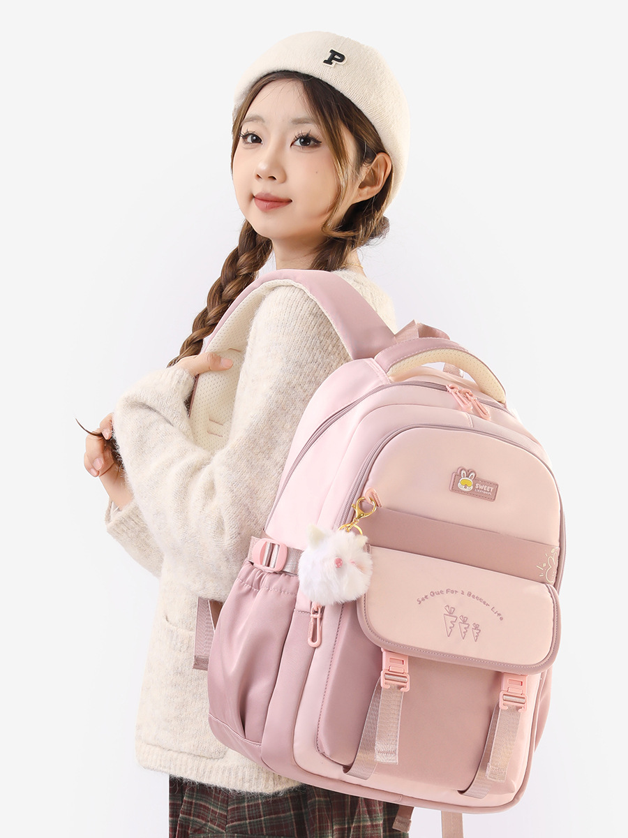 Mochila escolar de estudiantes de secundaria nueva hermosa mochila de chicas de viento para salir, mochila infantil de moda simple.