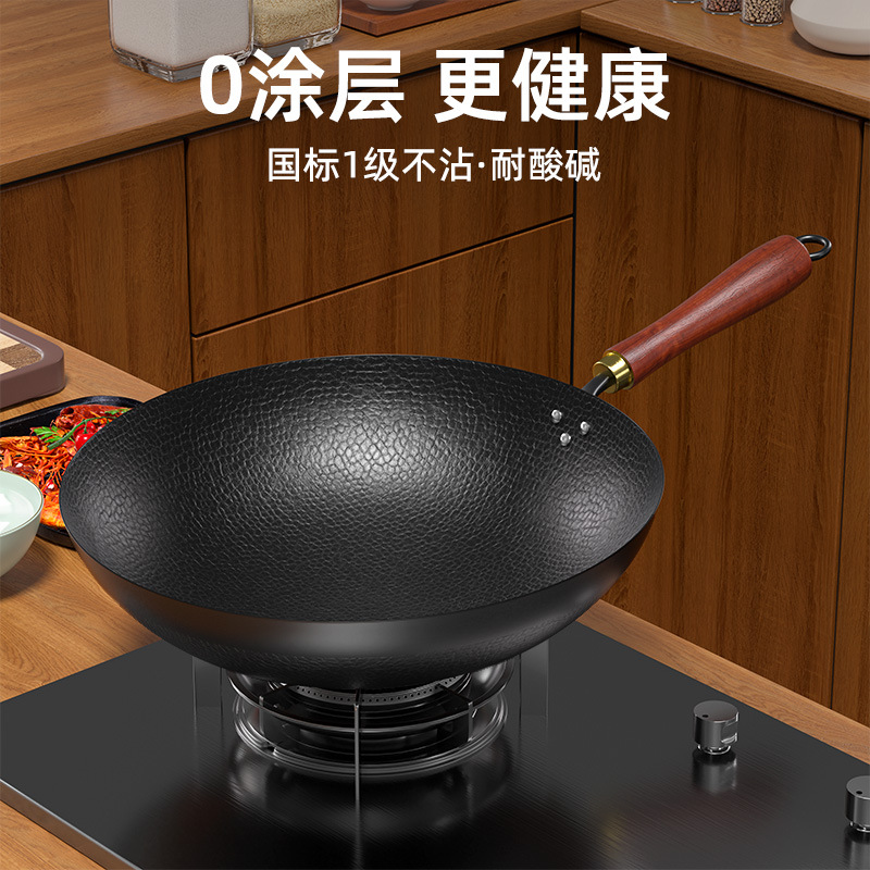 Nuevo tipo de olla de hierro tradicional forjada a mano sin recubrimiento antiadherente olla de horno general olla de hortalizas casera olla de frita