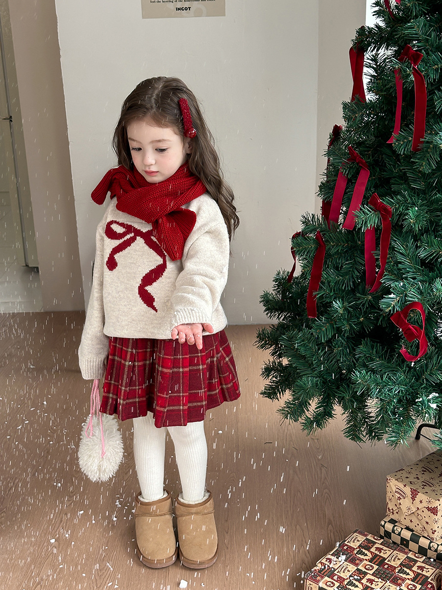 艾摩貝の子供服の韓国版2024冬の女の子の洋風の甘い蝶結びのジャカードの厚いニットのセーター