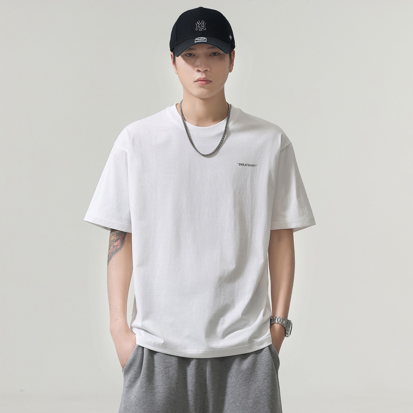 80 frío algodón camiseta de mangas cortas hombre 2026 verano transpirable camiseta de mangas cortas casuales blanco negro