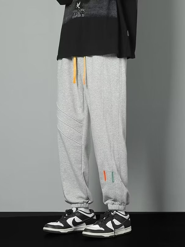 2024 primavera y otoño nuevos pantalones casuales para hombres de moda juvenil marca holgada pantalones deportivos de moda de moda