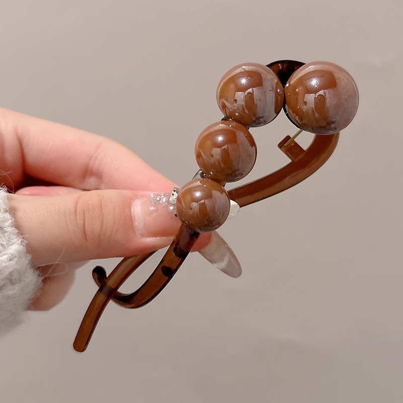 Otoño y invierno simple perla una abrazadera para el cabello torcida abrazadera para el cabello de la cabeza posterior de alta sensación abrazadera para el cabello