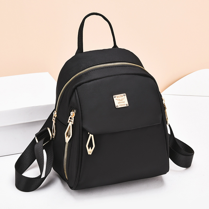 Mochila ligera damas Oxford 2023 nueva moda lienzo de nylon casual mini mochila impermeable