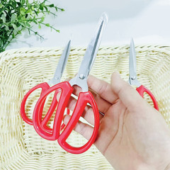 Reddish-purple household scissors, small paper-cutting scissors, stainless steel civilian industrial kitchen shears for cutting thread and fabric.